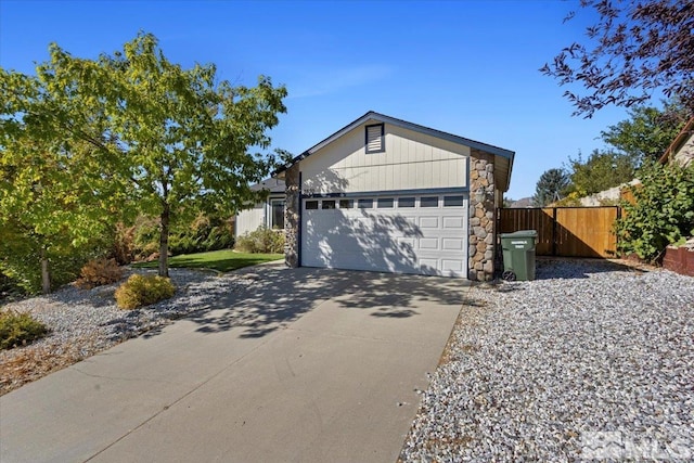 ranch-style house featuring a garage