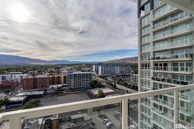 property's view of city featuring a mountain view