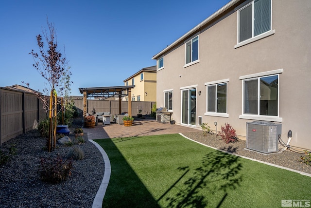 view of yard featuring a pergola, a patio, and central AC unit