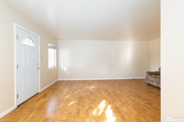 entrance foyer featuring light hardwood / wood-style floors