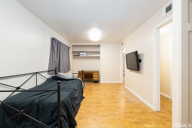 bedroom featuring hardwood / wood-style floors