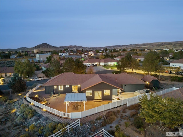 aerial view at dusk with a mountain view