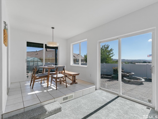 view of tiled dining space