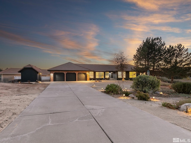 single story home with a garage