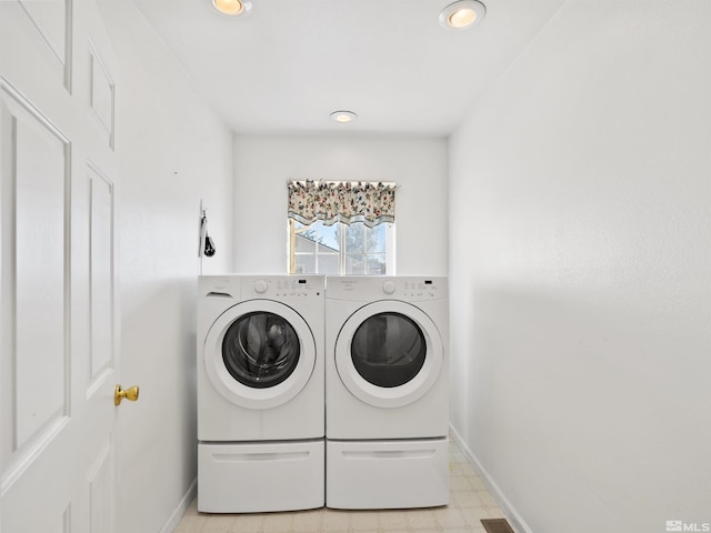 washroom with separate washer and dryer