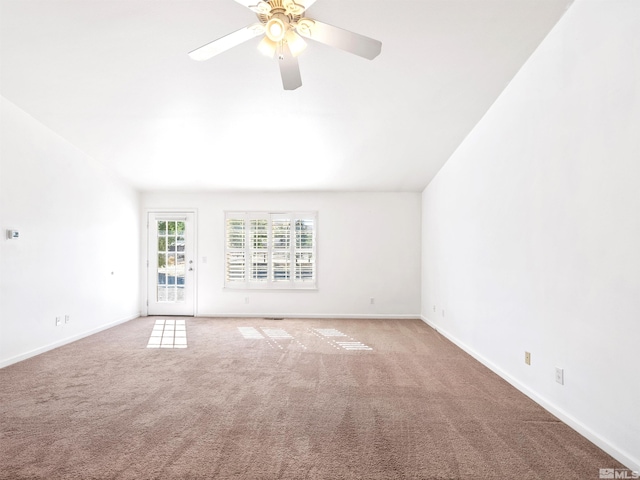 spare room with ceiling fan and carpet floors