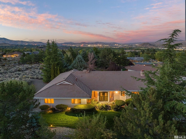 aerial view at dusk with a mountain view