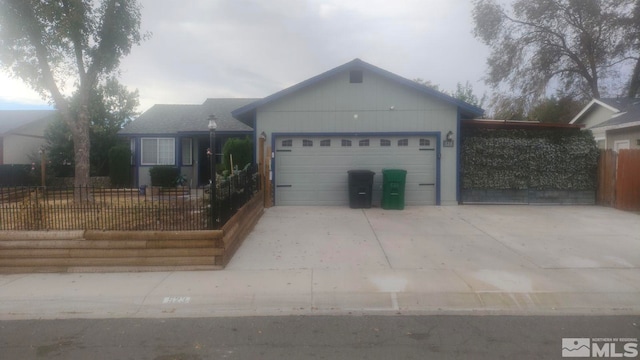 ranch-style home featuring a garage