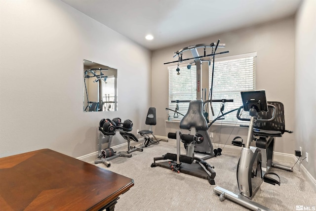 workout area featuring carpet