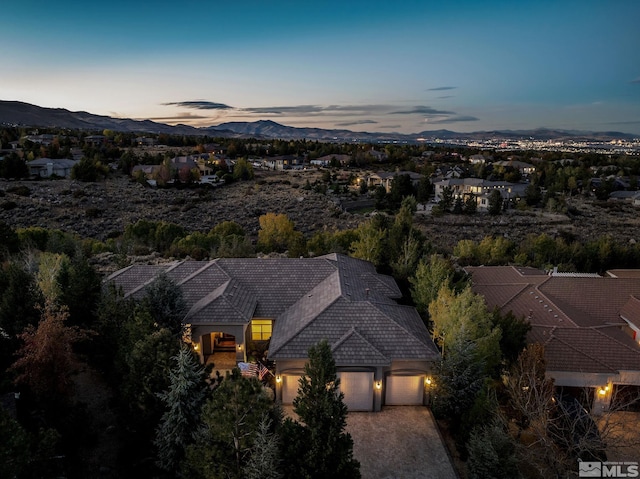 aerial view at dusk with a mountain view