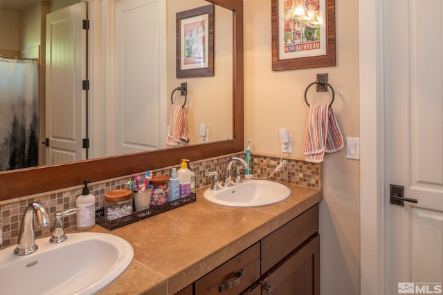 bathroom with vanity and decorative backsplash