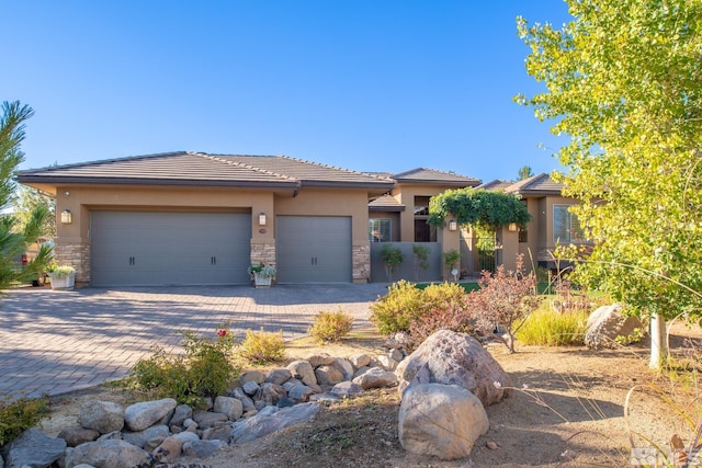 view of front of property with a garage