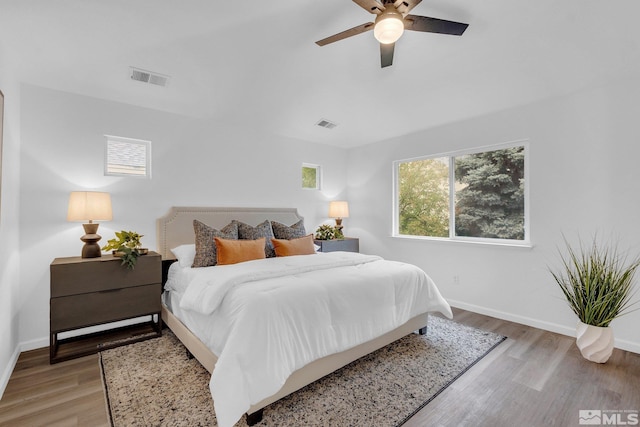 bedroom featuring light hardwood / wood-style flooring and ceiling fan