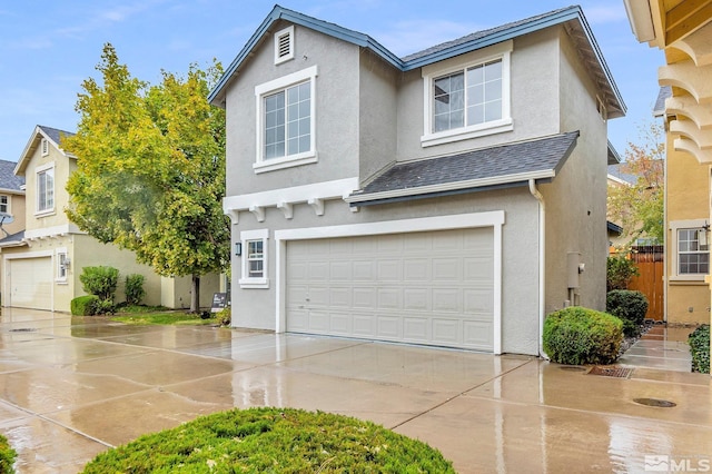 front of property with a garage