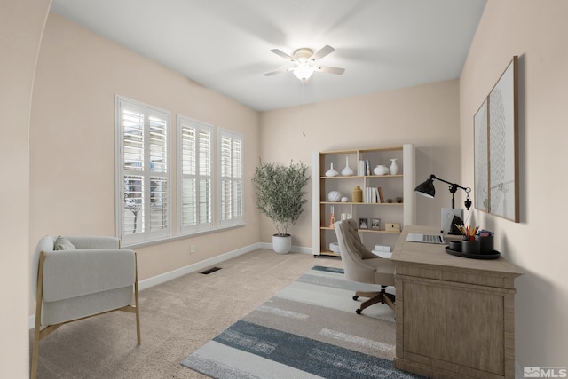 office featuring light colored carpet and ceiling fan