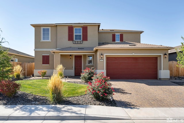 front of property featuring a garage