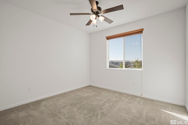 unfurnished room with light carpet and ceiling fan