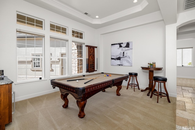 game room featuring a wealth of natural light, ornamental molding, a tray ceiling, and billiards