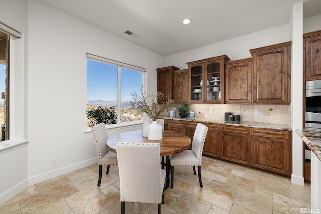 dining area with a mountain view