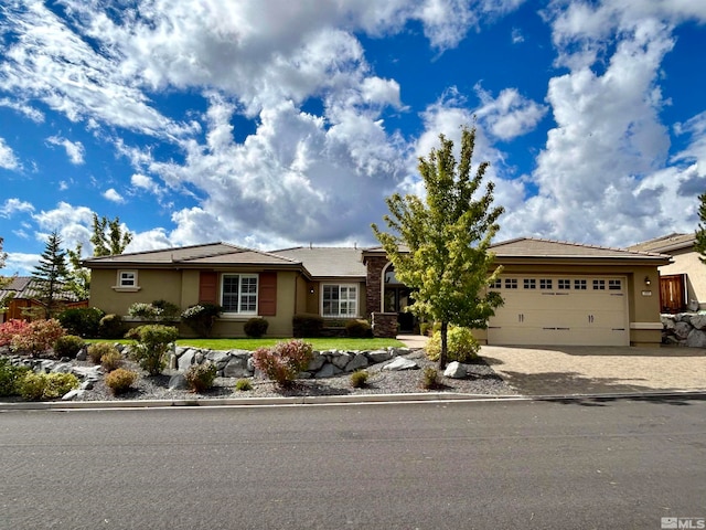 ranch-style house featuring a garage