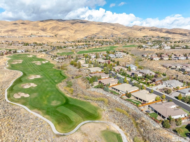 birds eye view of property featuring a mountain view