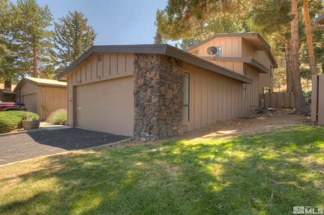 view of home's exterior with a yard