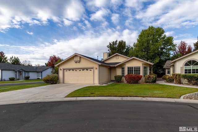 ranch-style home featuring a front yard and a garage