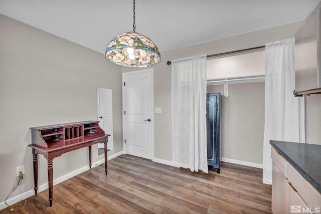 dining room featuring wood-type flooring