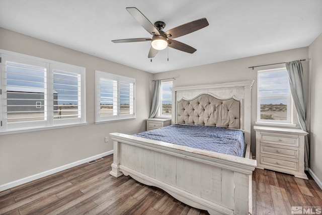 bedroom featuring ceiling fan and hardwood / wood-style flooring