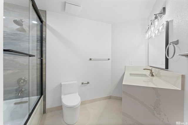 full bathroom featuring tile patterned flooring, vanity, combined bath / shower with glass door, and toilet