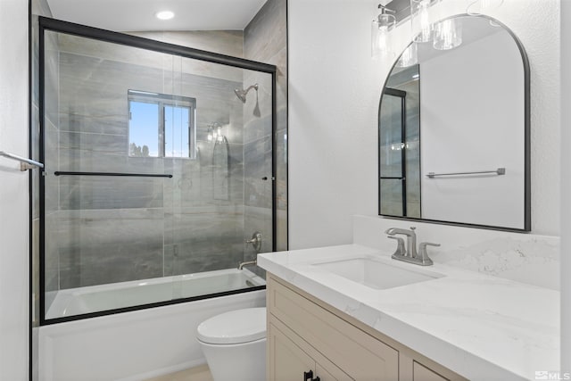 full bathroom with shower / bath combination with glass door, vanity, toilet, and lofted ceiling