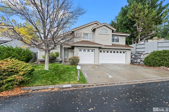 front facade with a front yard and a garage