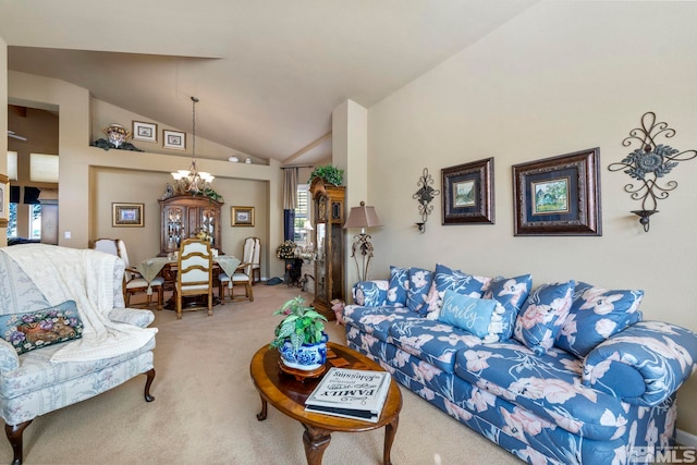 living room with an inviting chandelier, lofted ceiling, and carpet floors