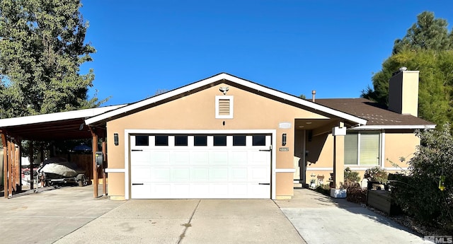 ranch-style house with a garage and a carport