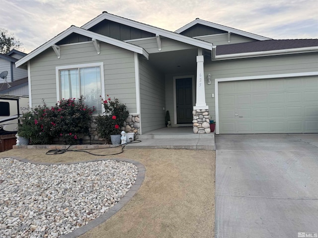 view of front of home with a garage