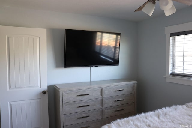 unfurnished bedroom featuring ceiling fan