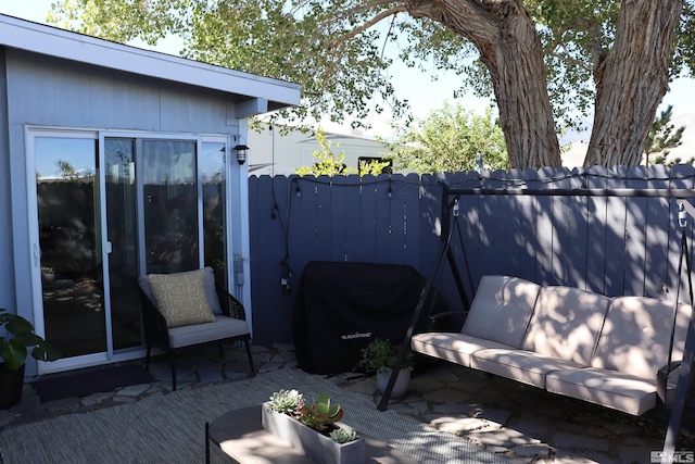 view of patio / terrace with area for grilling and an outdoor hangout area