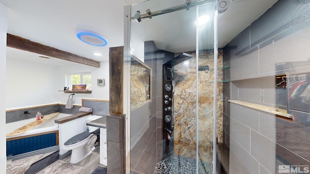 bathroom featuring walk in shower, wood-type flooring, tile walls, toilet, and vanity