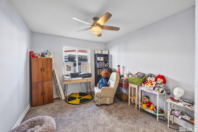 rec room featuring carpet flooring and ceiling fan