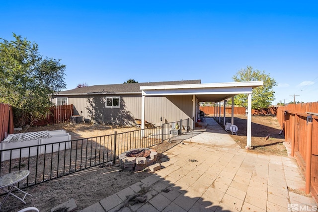 view of patio / terrace with an outdoor fire pit