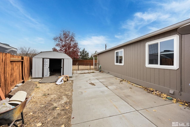 view of patio / terrace with a storage shed