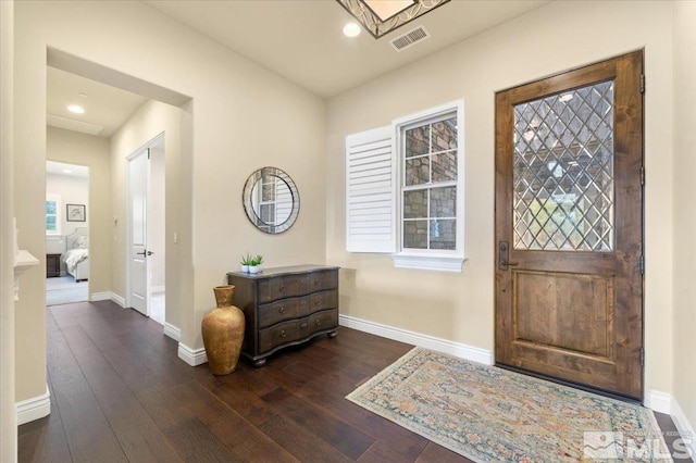 foyer entrance featuring dark hardwood / wood-style flooring