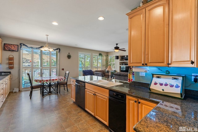 kitchen with sink, dishwasher, hanging light fixtures, ceiling fan, and dark stone counters