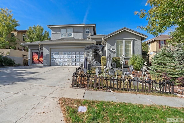 view of front of home with a garage