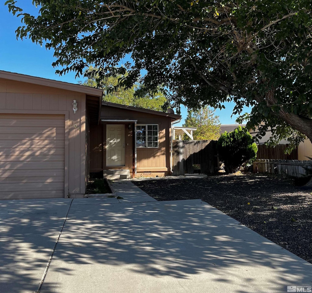 exterior space with a garage