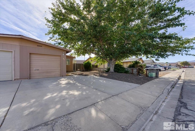 exterior space with a garage