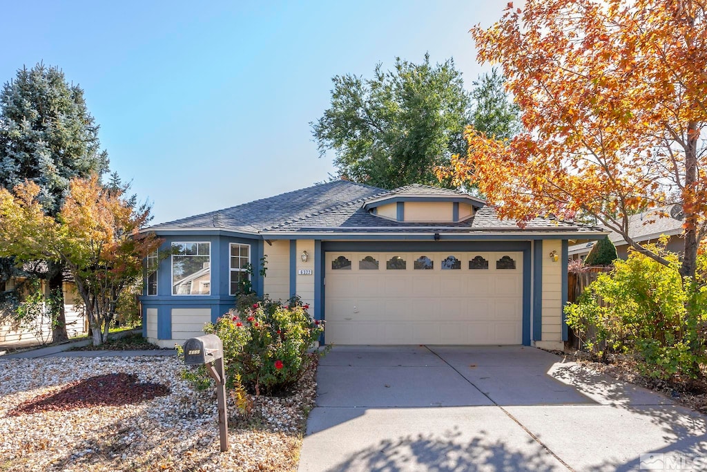 view of front of property with a garage