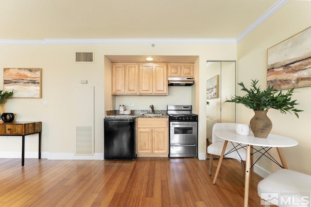 kitchen with black dishwasher, stainless steel stove, light brown cabinetry, dark hardwood / wood-style floors, and sink