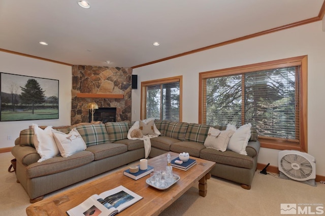 carpeted living room featuring crown molding and a stone fireplace