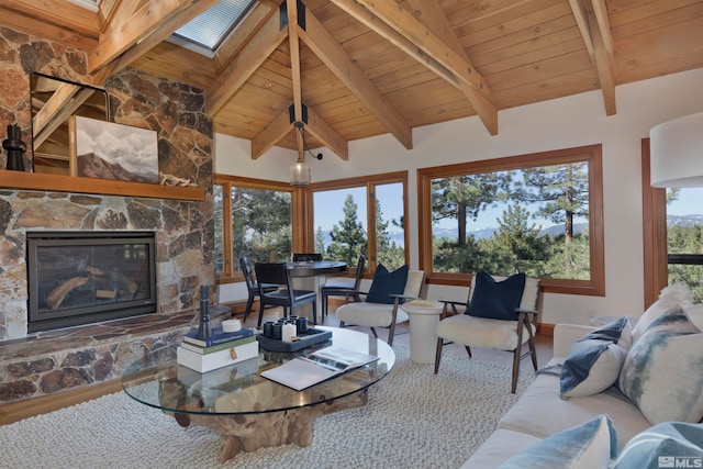 living room featuring vaulted ceiling with skylight, a fireplace, wood-type flooring, and wood ceiling